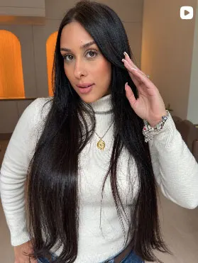 Client with long, straight black hair extensions